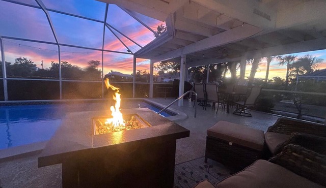 Renovated house with huge screened and heated pool and canal on Charlotte Harbor