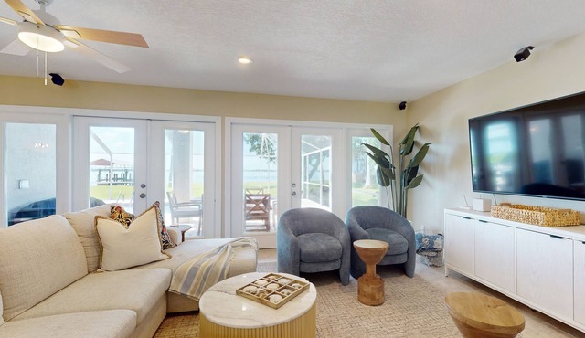 Riverfront House with pool, panoramic views, and covered balcony