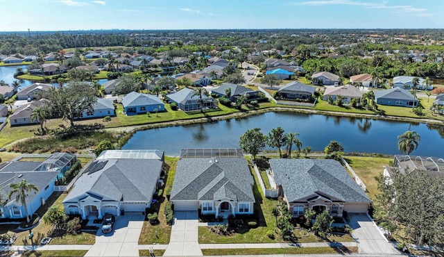 Spacious, family friendly 4-bedroom, pool/spa lakefront home.