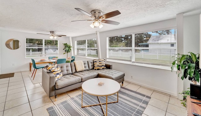 Sustainable Suncoast getaway with large fenced yard, AC, & W/D - dog-friendly