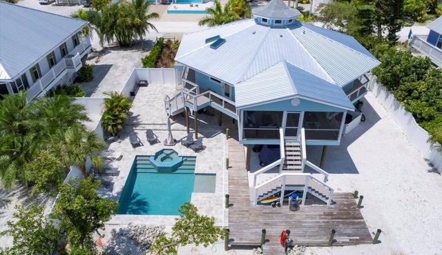 The Water House - Unique Octagonal Island Home with Heated Pool and Private Dock!
