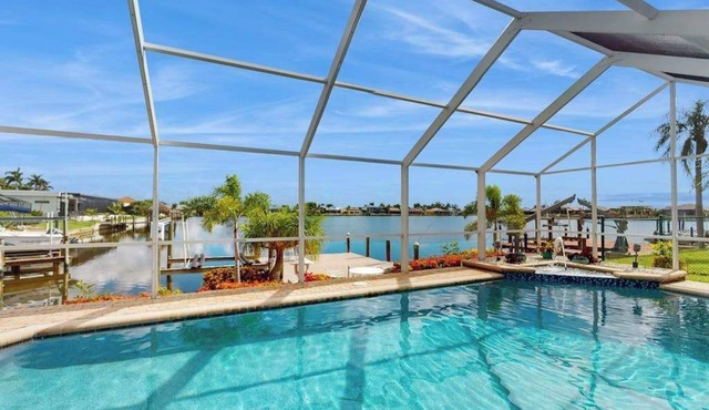 Villa Aasta | Luxe Lakefront Outdoor Living | Screened Pool, Game Room & Dock
