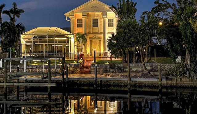 Villa Euphoria: Chic 2-unit, canal-front retreat with 2 pools & private dock