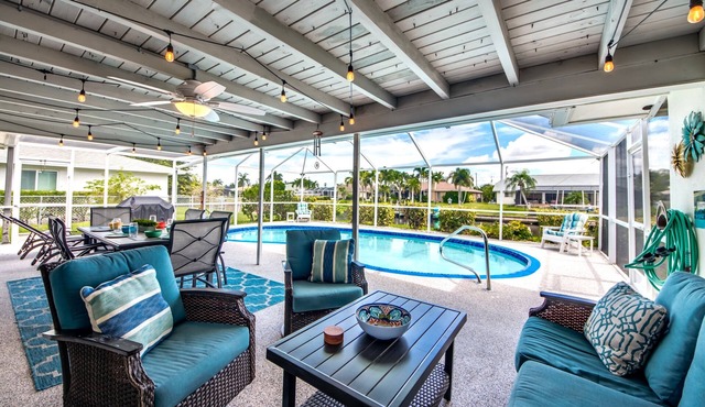 Villa Tropical Vibes - Charming 3 BR waterfront Villa with heated pool, bicycles, fishing poles - walking distance to bars and restaurants