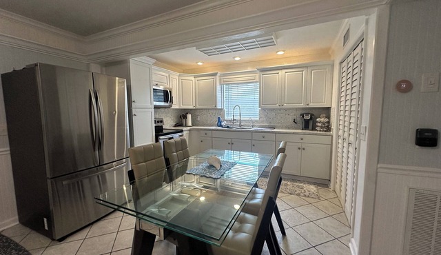 Waterfront Everglades basecamp with dock, trailer parking, and direct bay access