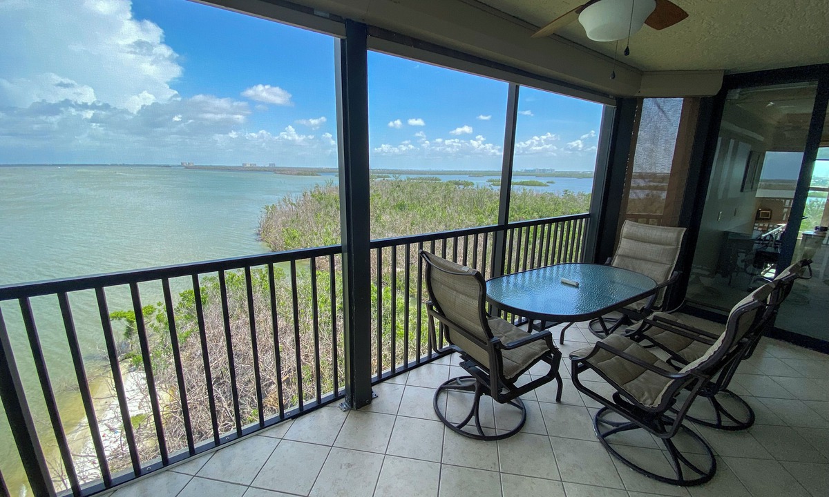 Punta Rassa Condo | Sanibel Harbour 817: Wrap-around lanai-Amazing Water Views! Enjoy private beach &activities nearby.