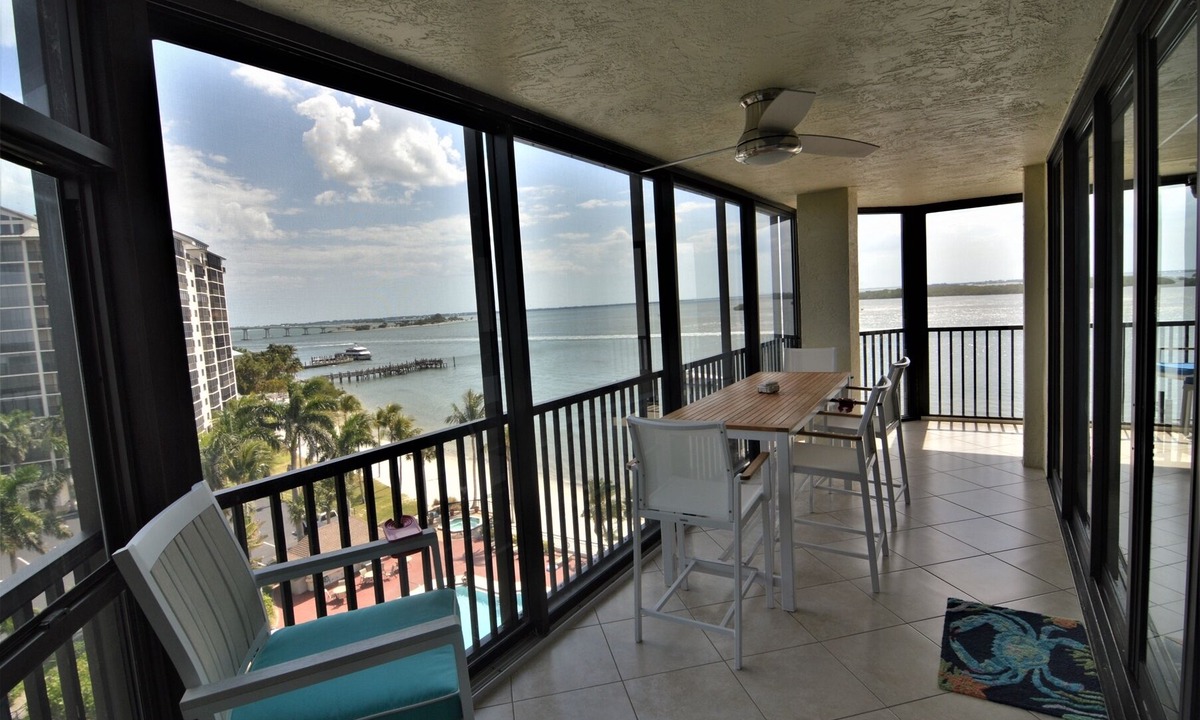 Punta Rassa Condo | Sanibel Harbour Resort: Harbour Tower 711 Updated beachfront condo with wrap-around lanai.