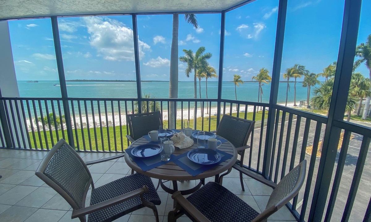 Punta Rassa Condo | Sanibel Harbour Resort 237: Experience the sunsets on this Waterfront wrap around lanai