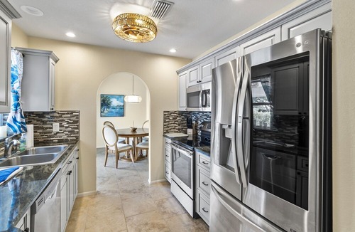 Englewood East House | Tiki Cove Retreat Heated Salt Water Pool & Tiki Bar