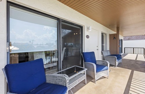 Shell Harbor Condo | Beautiful Canal Front Tennisplace C32 Condo close to everything! NEW!