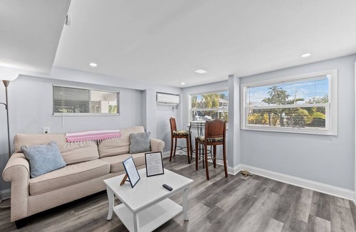 Mid Island Apartment | New to Market! Gorgeous Florida Coastal Renovation, Steps to the Sugar Sand Beach of FMB!