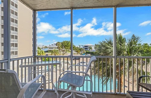 Bonita Springs Condo | 3RD FLOOR STUDIO | POOL-VIEW LANAI | KING BED | FREE PARKING | STEPS TO BONITA BEACH