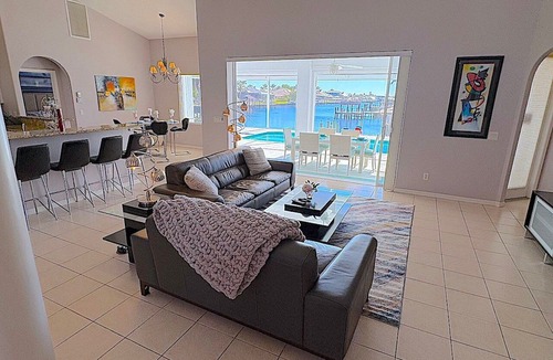 Pelican House | Michaela 1059 Gulf Access 3BR Heated Pool/Spa and Large Dock with Tiki, Kayaks Included