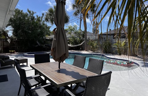 Redington Beach House | Relax and have some fun in this Salt water heated pool home, 5min walk to beach