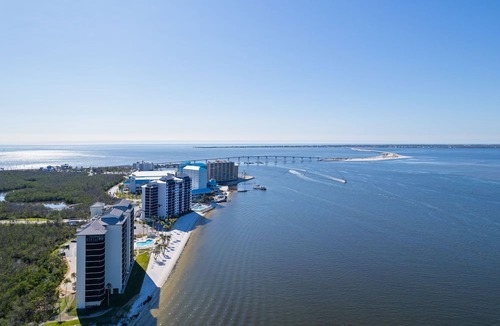Punta Rassa Condo | Sanibel Harbour Resort Bay View Tower 535: Beachfront vacation retreat with stunning sunset views.
