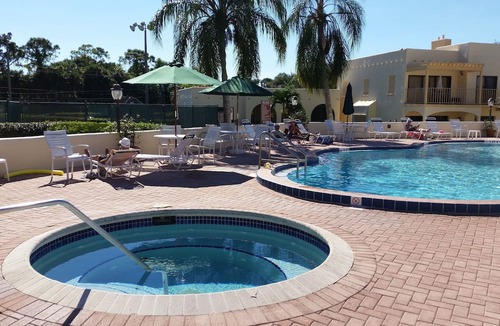 Central Naples Condo | World Tennis Club Condo, Lake View Gated Community