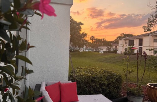 East Lake Woodlands Condo | Sunset Escape Heated Pool : Honeymoon Island Pass + Gated Community