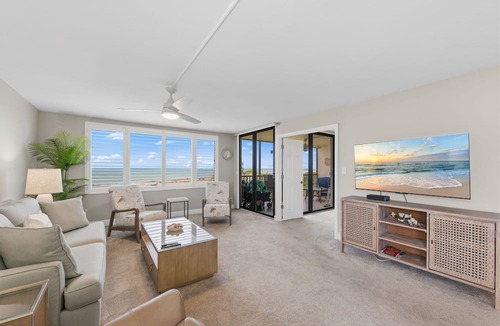 Sanibel Condo | Welcome to Loggerhead Cay 503, a beachfront corner condo with two private lanais showcasing breathtaking sunrise and sunset views. Sleeps 6 with beach gear, heated pool, tennis, pickleball, in-unit washer/dryer, and direct beach access.