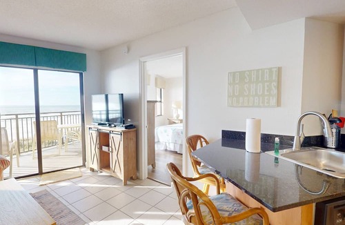 Belle Vista Condo | Beachfront 2BR at Vistas on the Gulf. Heated Pool and Hot Tub. Primary Bedroom with a Beach View.