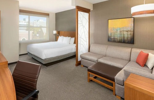Greenville Downtown Apartment | Family Getaway! 1 King Bed w/Indoor Pool and Gym Access, Downtown Views!