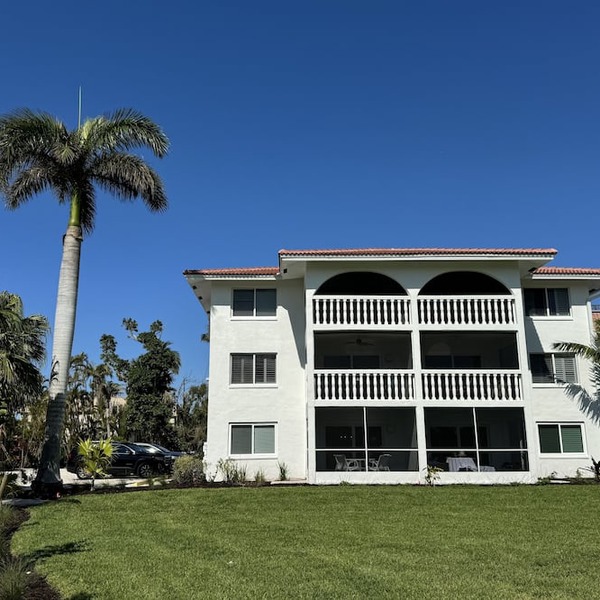 End unit with extra windows. Steps to the beach, private beach access!