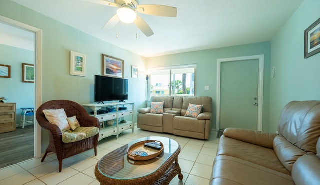 Share Our Island Paradise-100 flip-flop steps to the beach.